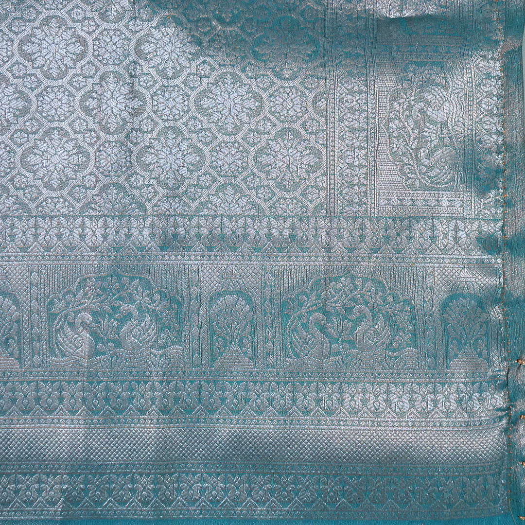 Thara Silk in Turquoise Blue Base with Floral works