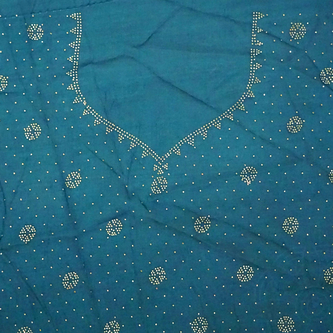 Ratnalekha silk saree in rich teal-blue base adorned with intricate gold zari work,