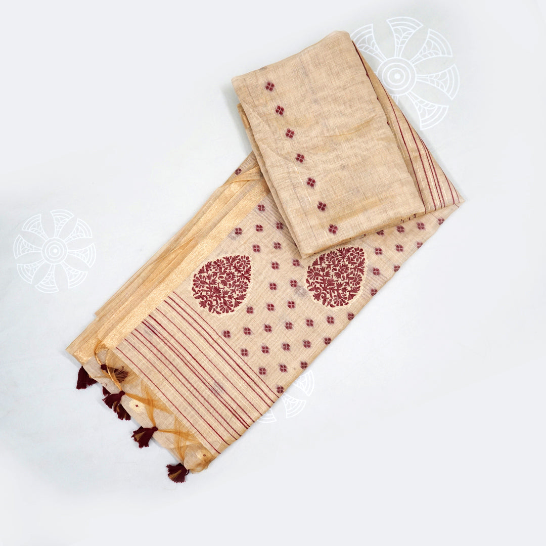 Beige Ishvani Tussar saree with Maroon tassels