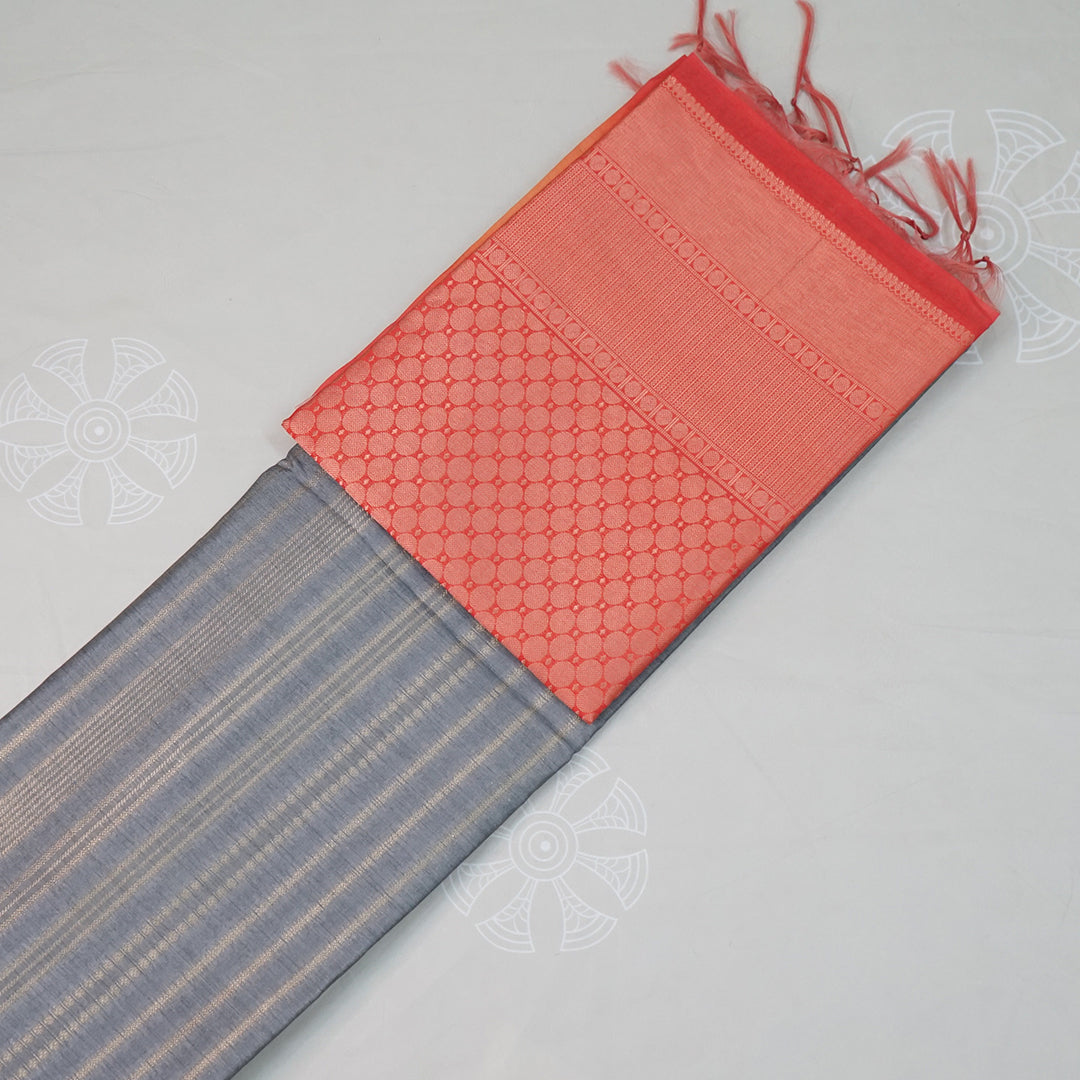 Subtle Grey Gokul Tussar with Red and Orange border.