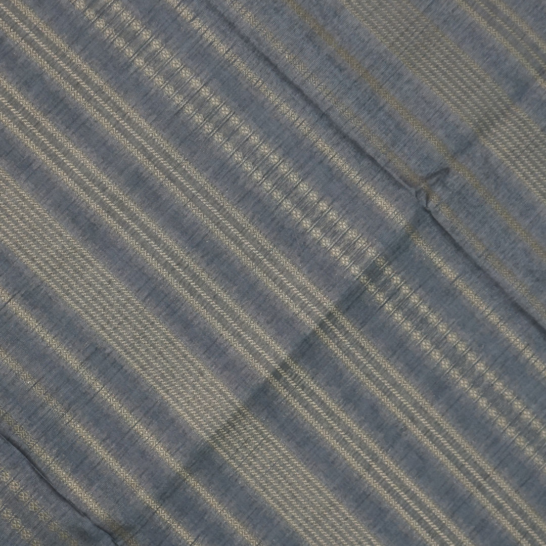 Subtle Grey Gokul Tussar with Red and Orange border.