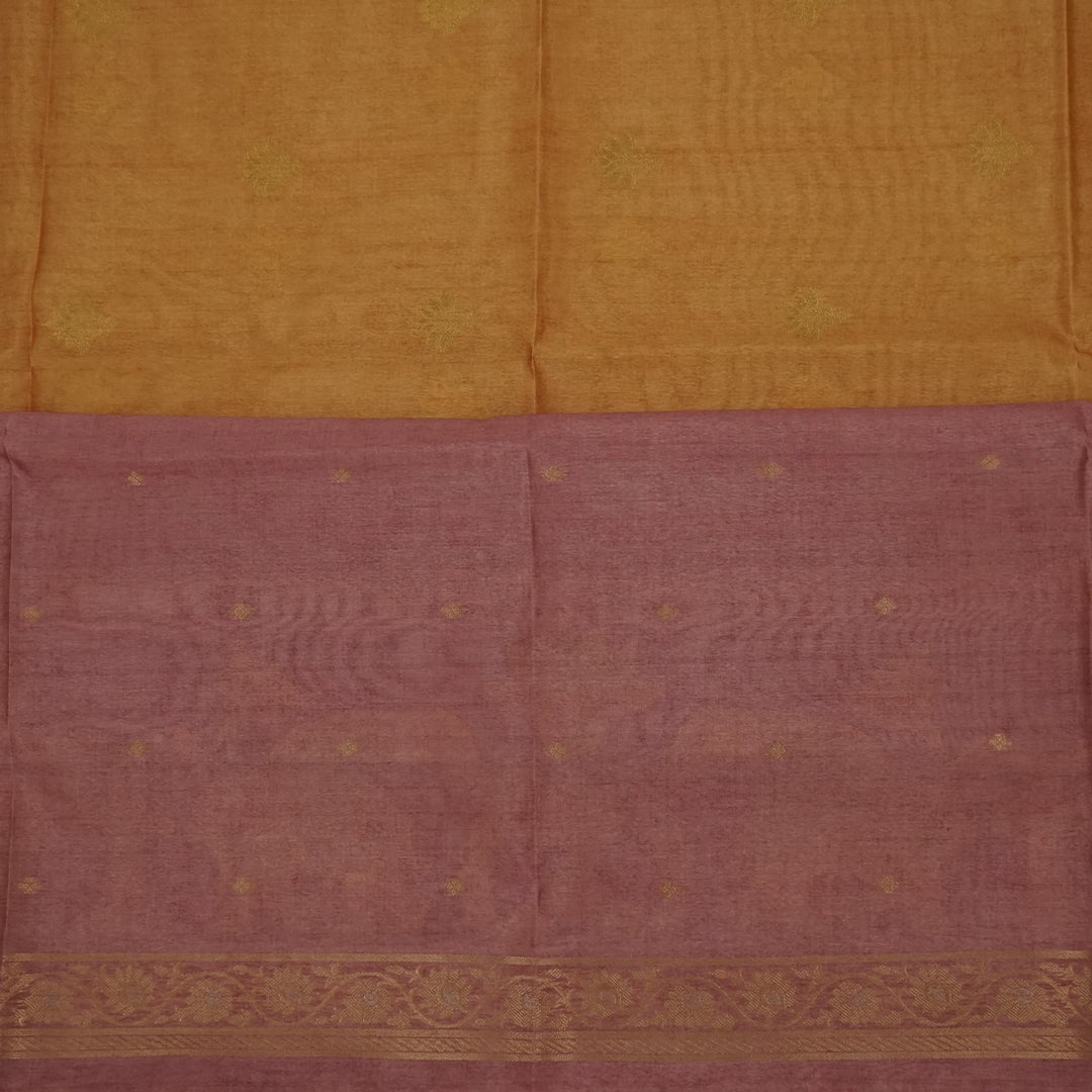 Golden Amber Ambari Silk Tussar with Dusky Mauve border and Zari works.