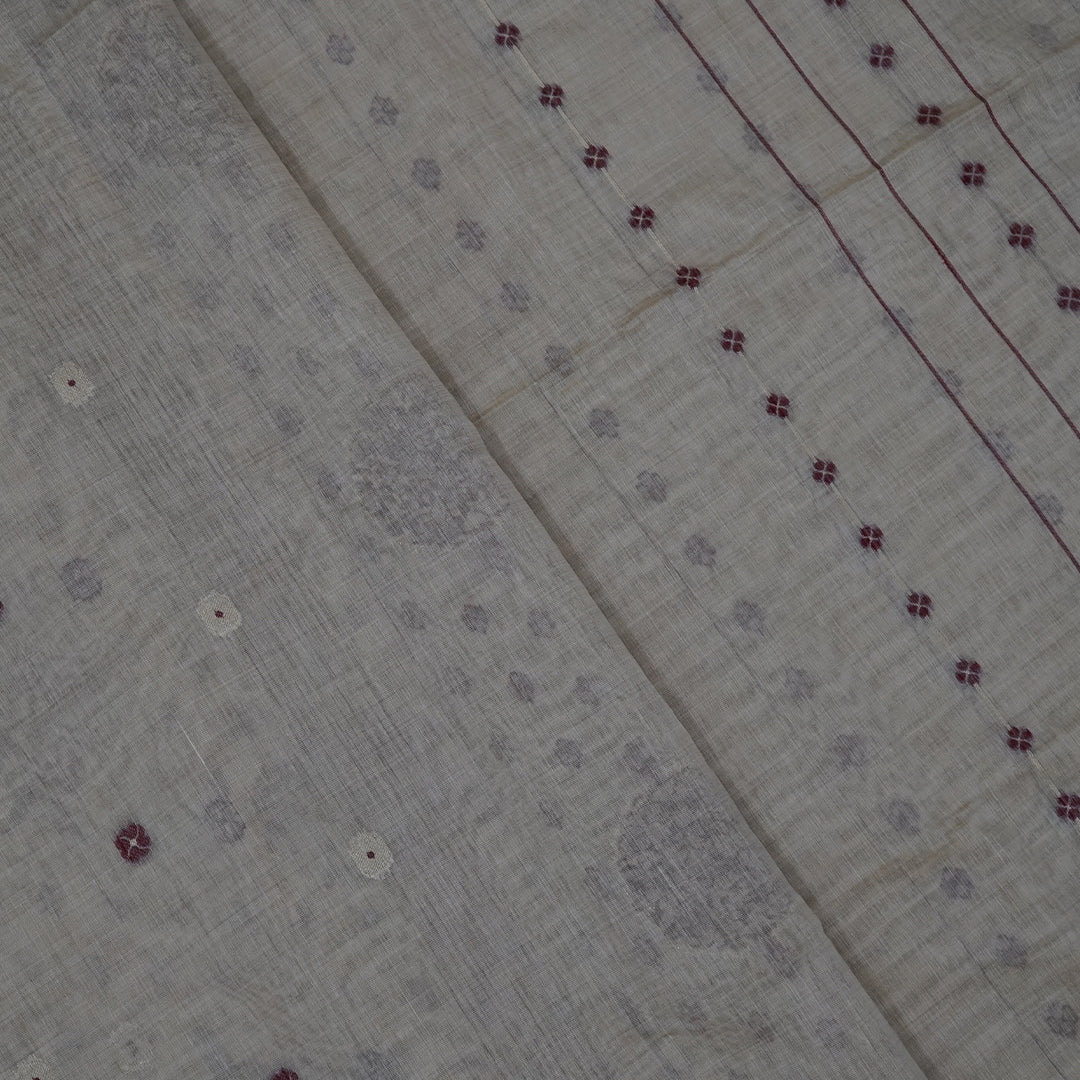 Beige Ishvani Tussar saree with Maroon tassels