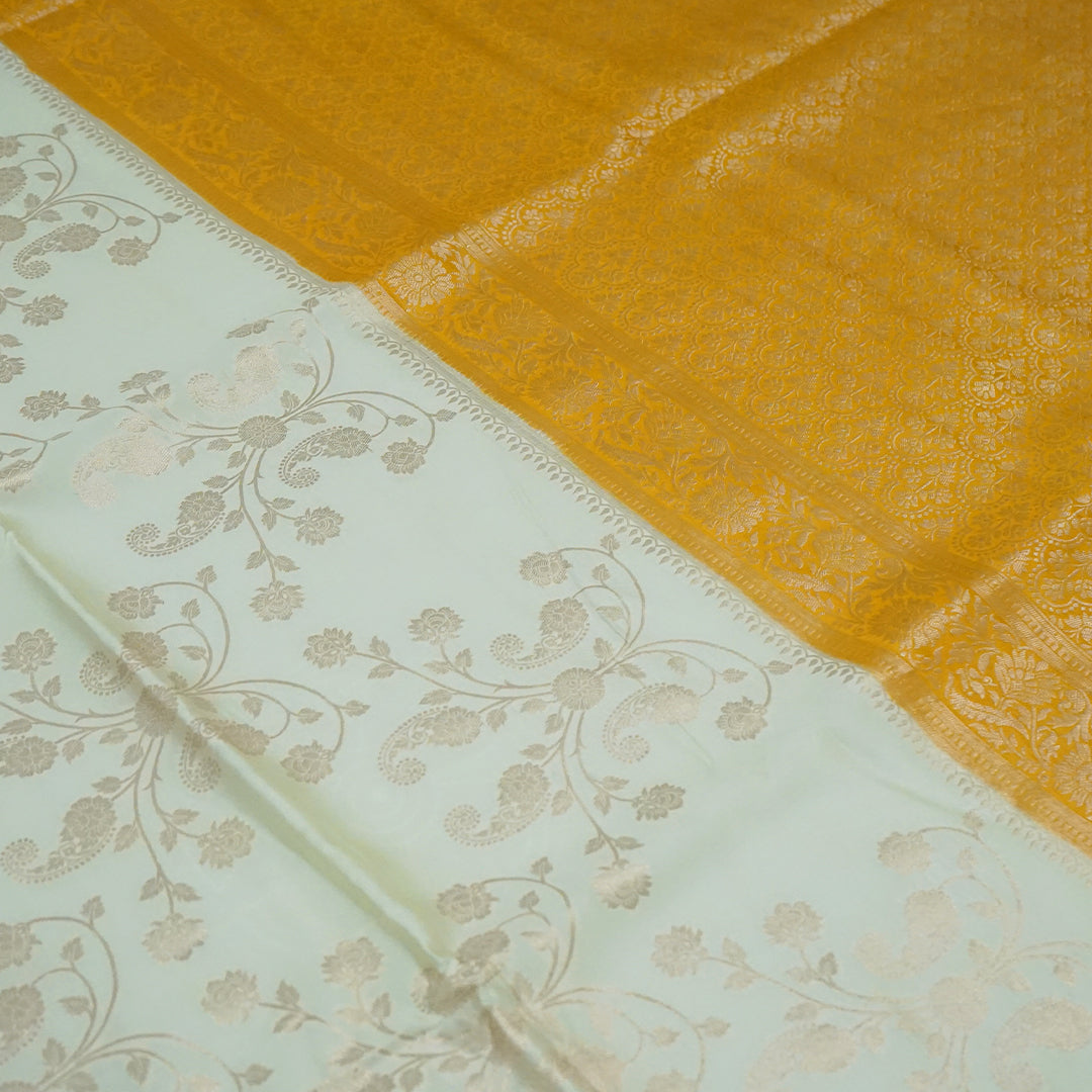 Ivory - Mustard Mahalakshmi Viscose saree with Floral and Zari works