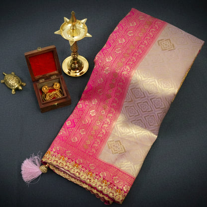 Royal lavender-pink Raj Virasat silk saree with floral motifs and zari works