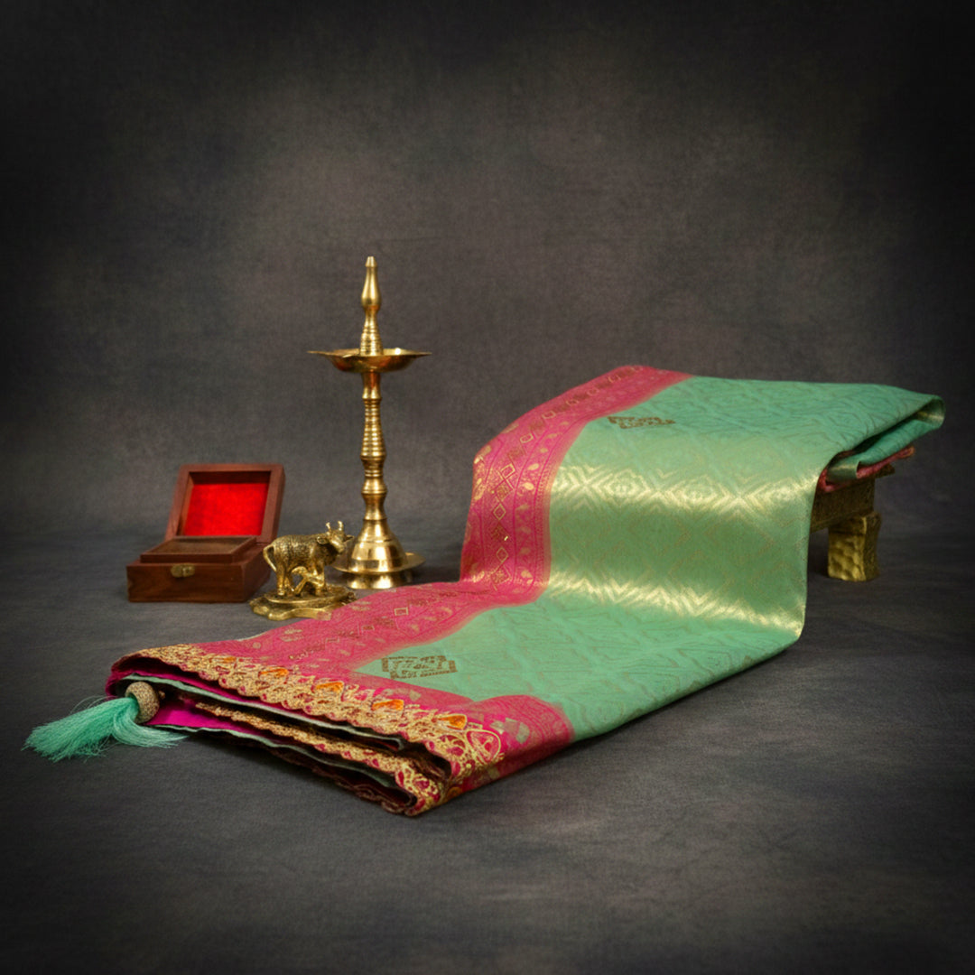 Mint Green Raj Virasat Silk saree with Deep purple base and heavy embroidery.