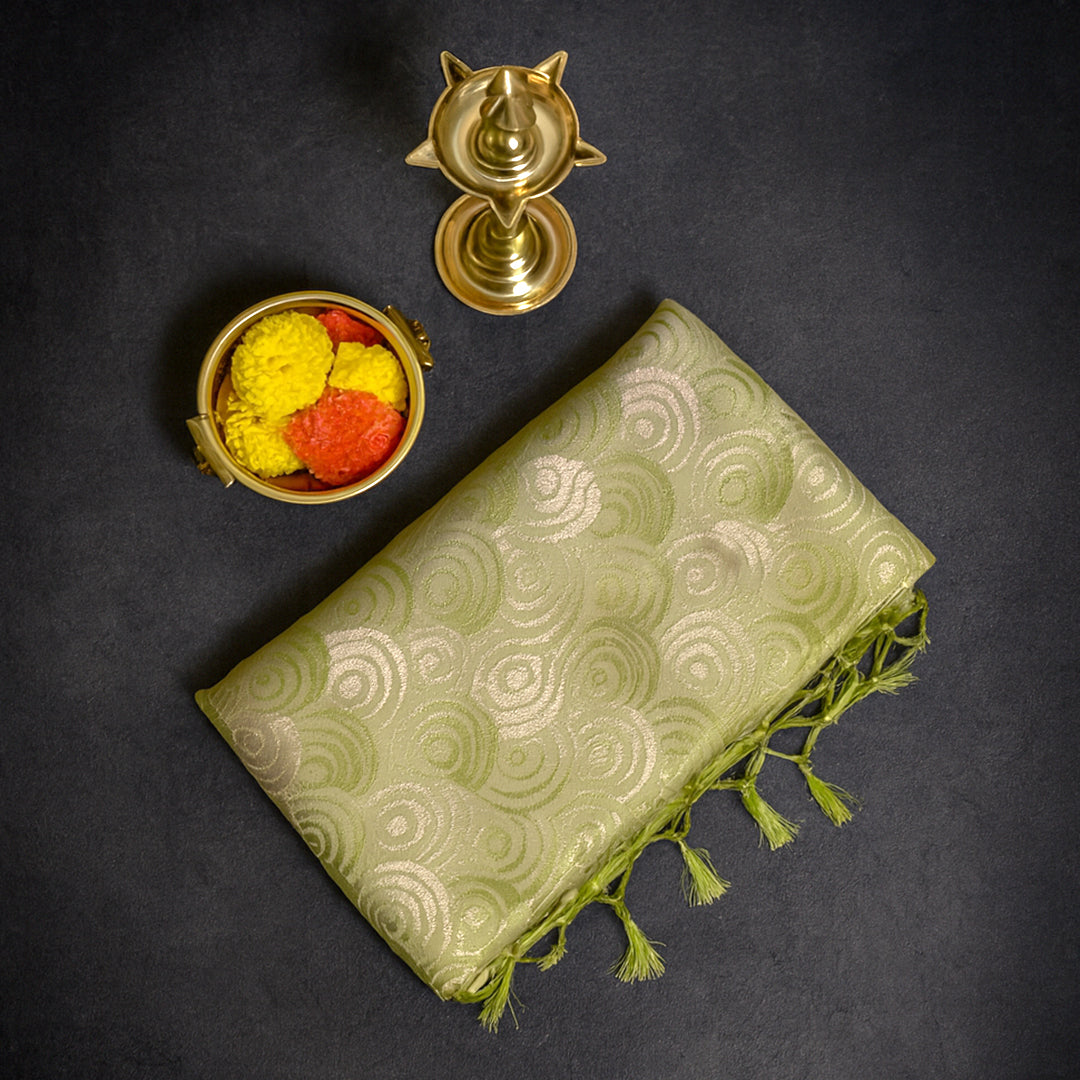 Soothing light olive green shade Suhani Silk with a subtle golden sheen