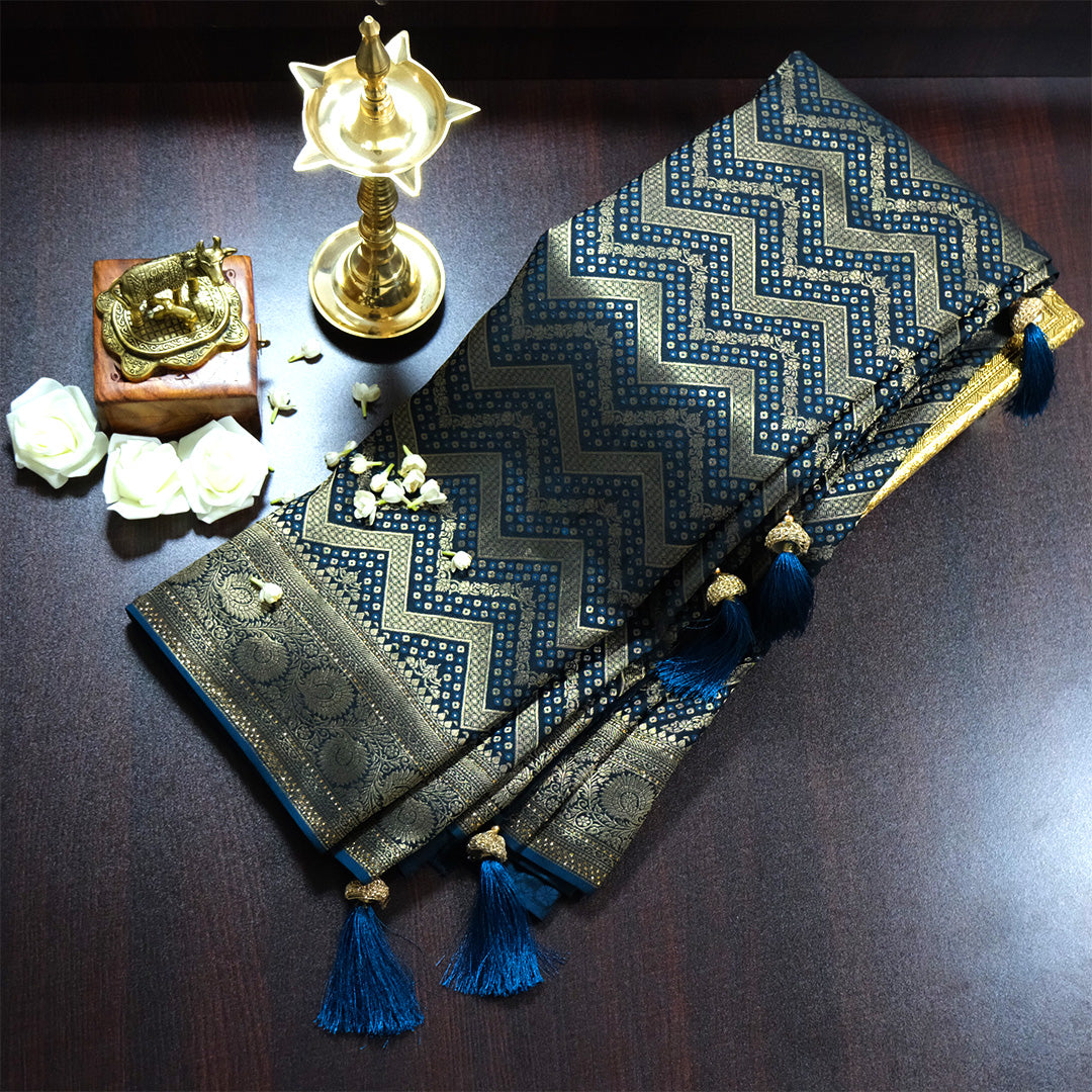Tarani Silk saree in deep navy blue shade with a rich golden zari weave.