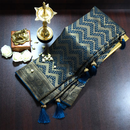 Tarani Silk saree in deep navy blue shade with a rich golden zari weave.