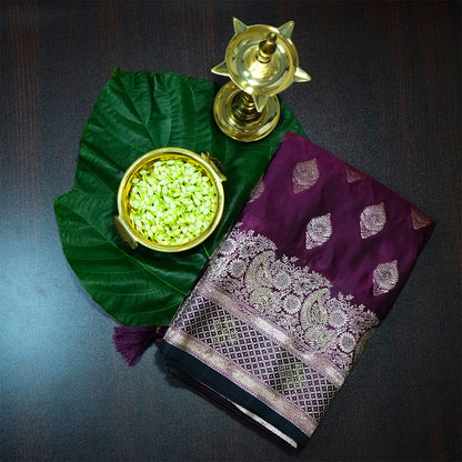 Rithvi Satin Deep plum shade color adorned with intricate golden zari embroidery
