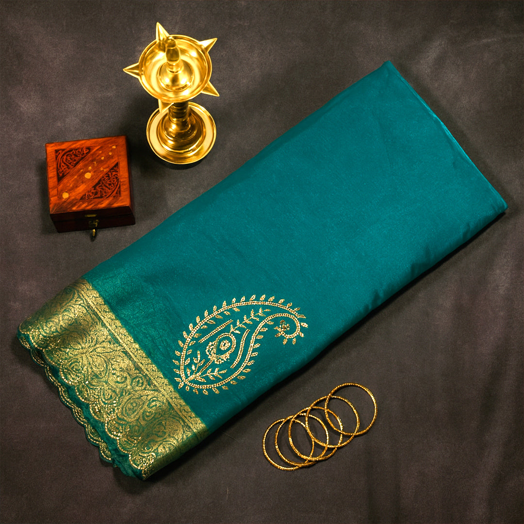 Ratnalekha Silk saree in rich emerald-green base accentuated with intricate gold zari work