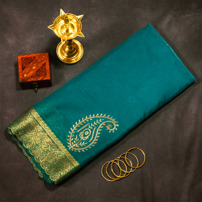 Ratnalekha Silk saree in rich emerald-green base accentuated with intricate gold zari work