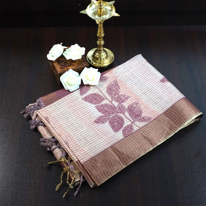 Harini Tussar in soft beige base with maroon leaf motifs and a matching brownish-maroon border, creating an elegant and earthy look.