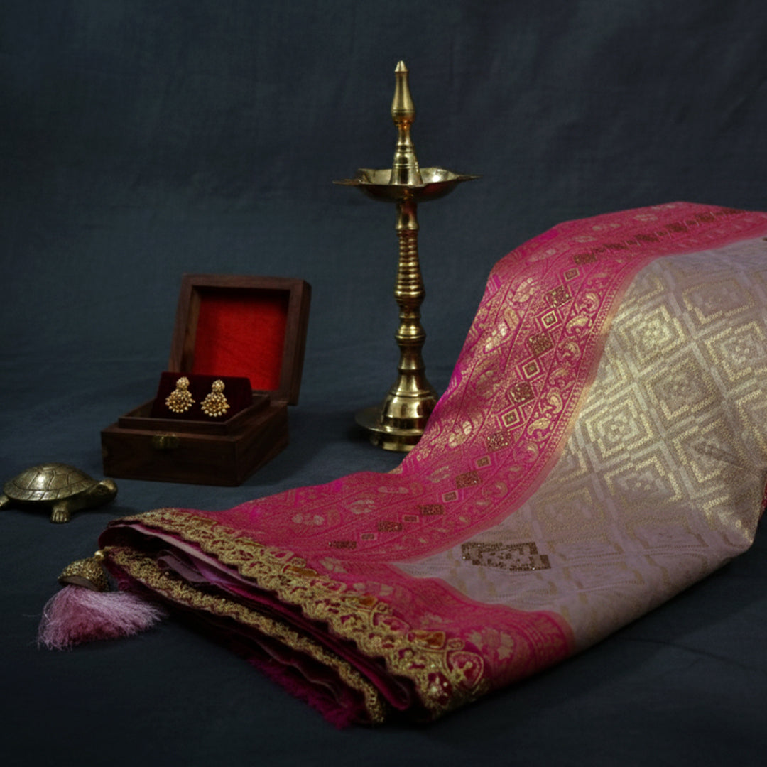 Royal lavender-pink Raj Virasat silk saree with floral motifs and zari works