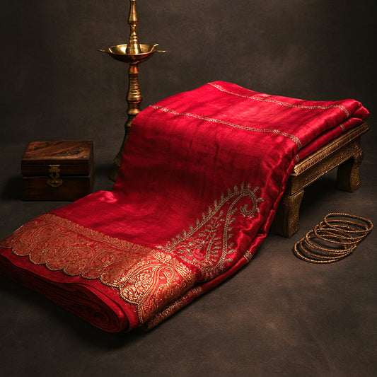 Ratnalekha silk saree in vibrant deep red base accentuated with intricate gold zari embroidery,