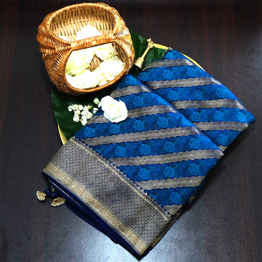 Megha Silk saree in rich royal blue with alternating metallic gold zari stripes.