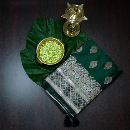 Rithvi Satin Emerald-green shade color adorned with intricate golden zari embroidery
