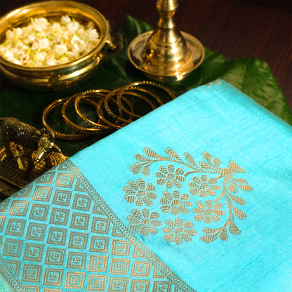Chandhrika in Aqua Blue base with floral works