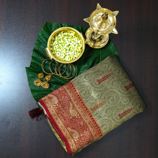 Madhur Bela Muted olive green shade with an elegant golden sheen
