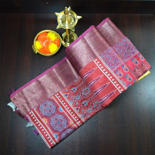 Tanvi in Multicoloured patterns in Rich Maroon Base with hues of Blue, White and Orange