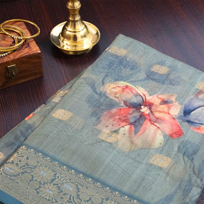 Hirakshi Silk in Teal Blue base with floral prints