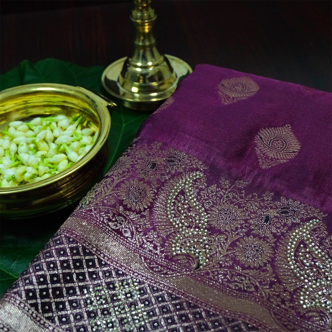 Rithvi Satin Deep plum shade color adorned with intricate golden zari embroidery