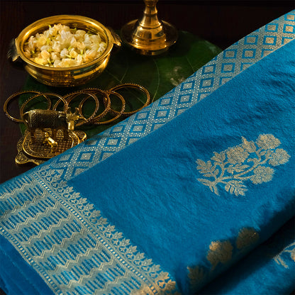 Neera Silk Saree in Vibrant Turquoise Blue with Floral works