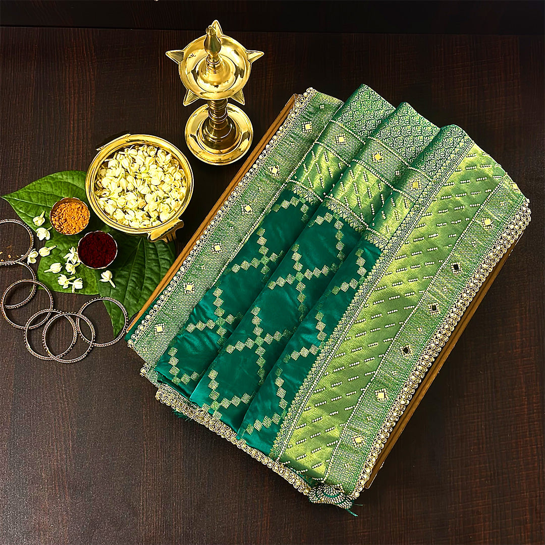 Samrudhi silk saree in vibrant combination of emerald green and lime green with a lustrous Banarasi silk finish.