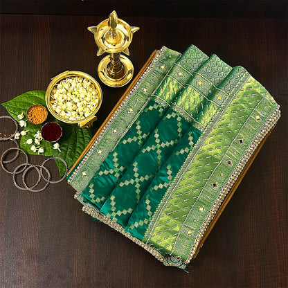 Samrudhi silk saree in vibrant combination of emerald green and lime green with a lustrous Banarasi silk finish.