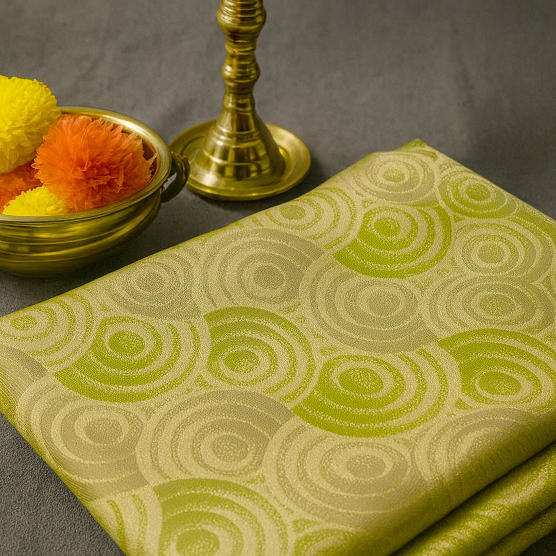 Soothing light olive green shade Suhani Silk with a subtle golden sheen