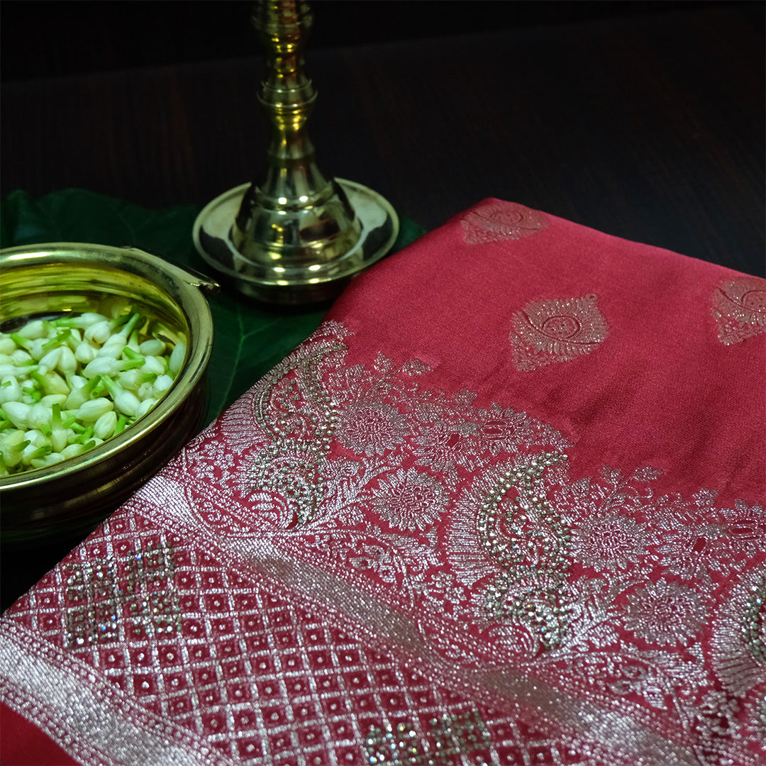 Rithvi Satin Deep red color adorned with intricate golden zari embroidery