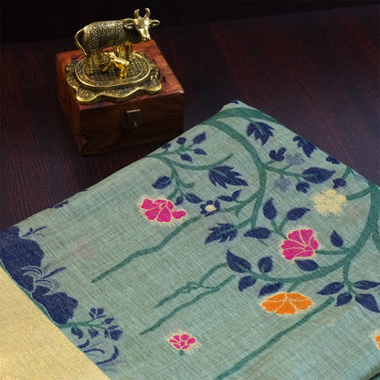 Varnica Tussar Soft pastel green shade with a subtle golden shimmer