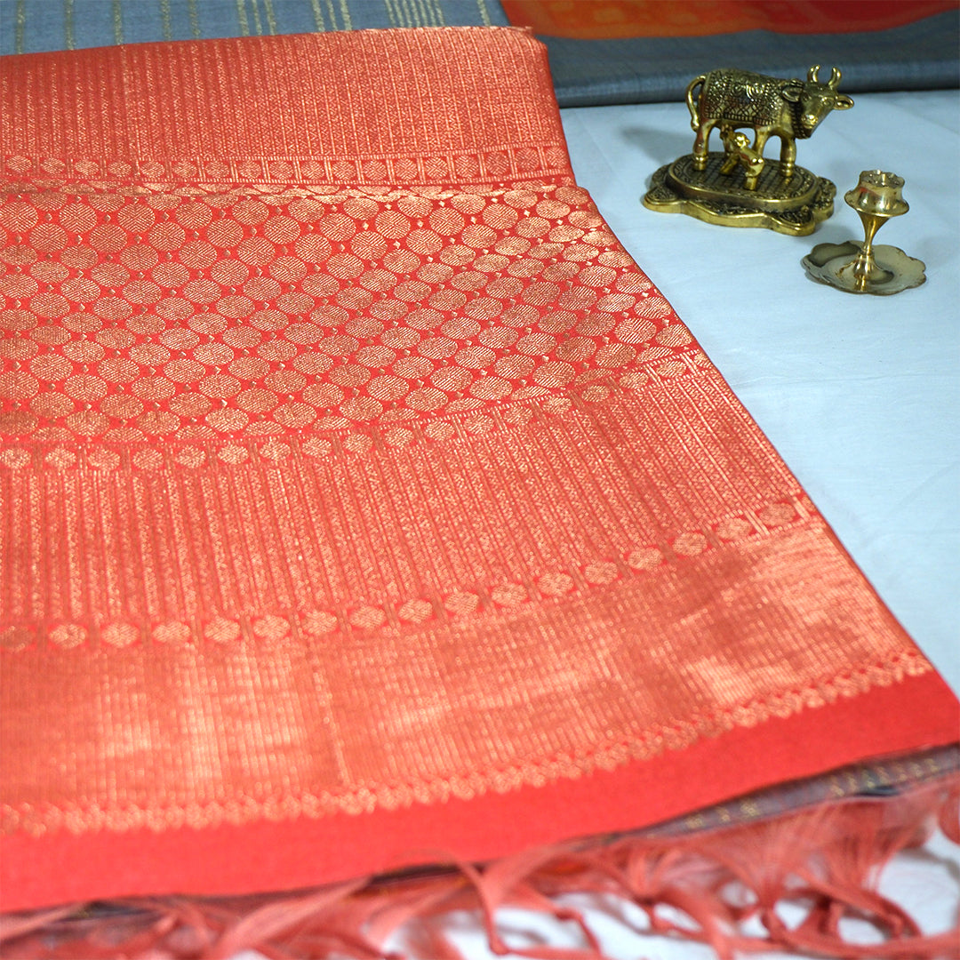 Subtle Grey Gokul Tussar with Red and Orange border.