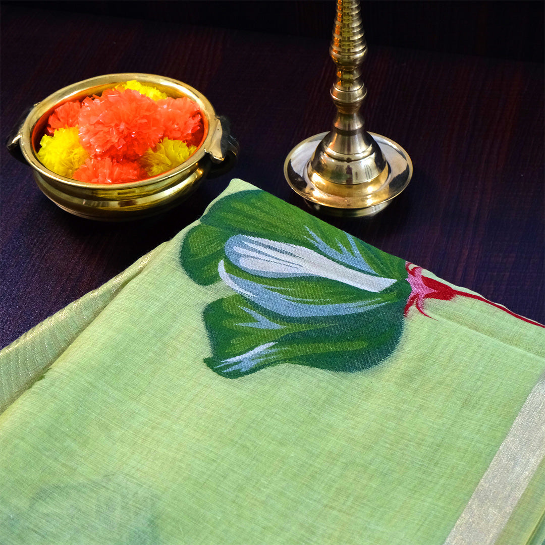 Resham Tussar Soft pastel green shade with a light golden sheen.