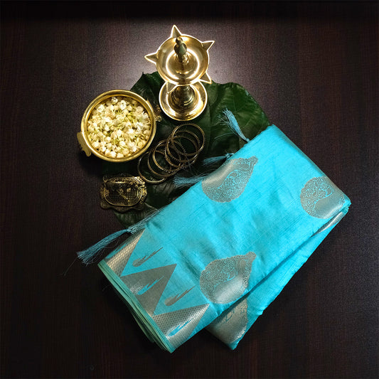 Chandhrika in Aqua Blue base with floral works