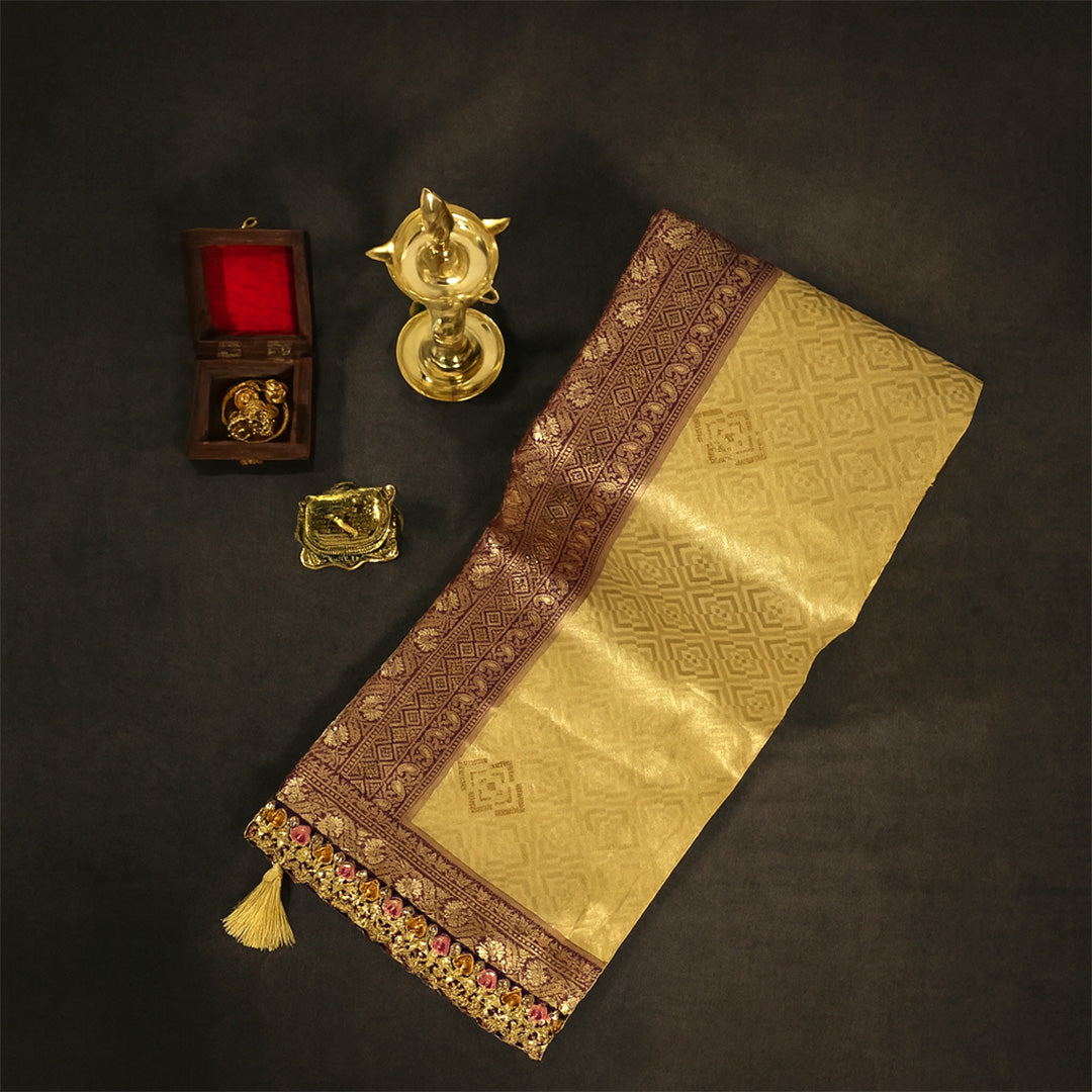 Golden cream Raj Virasat Silk saree with Deep purple base and heavy embroidery.