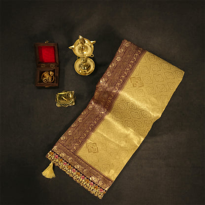Golden cream Raj Virasat Silk saree with Deep purple base and heavy embroidery.