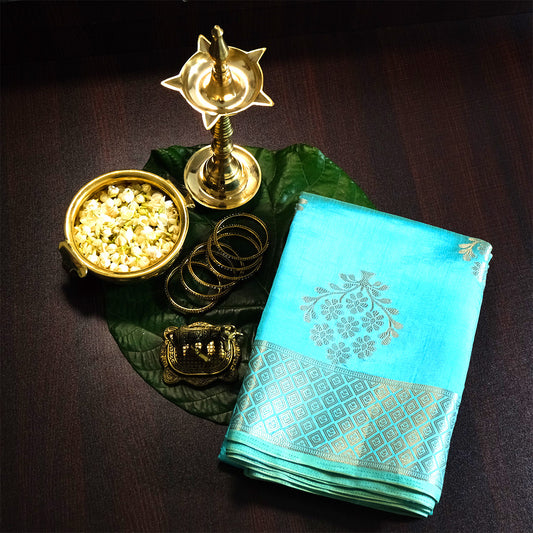 Chandhrika in Aqua Blue base with floral works