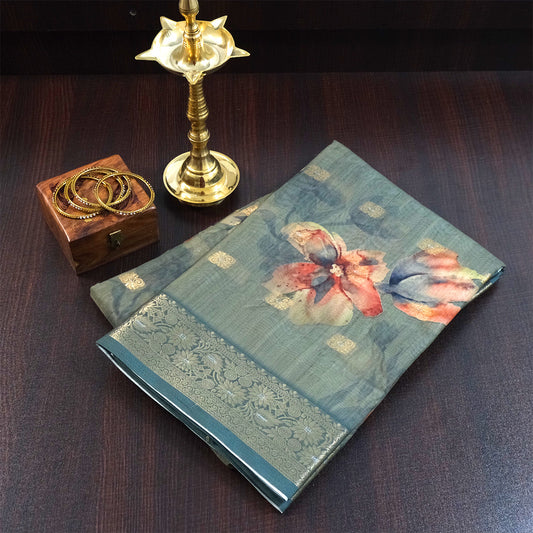 Hirakshi Silk in Teal Blue base with floral prints