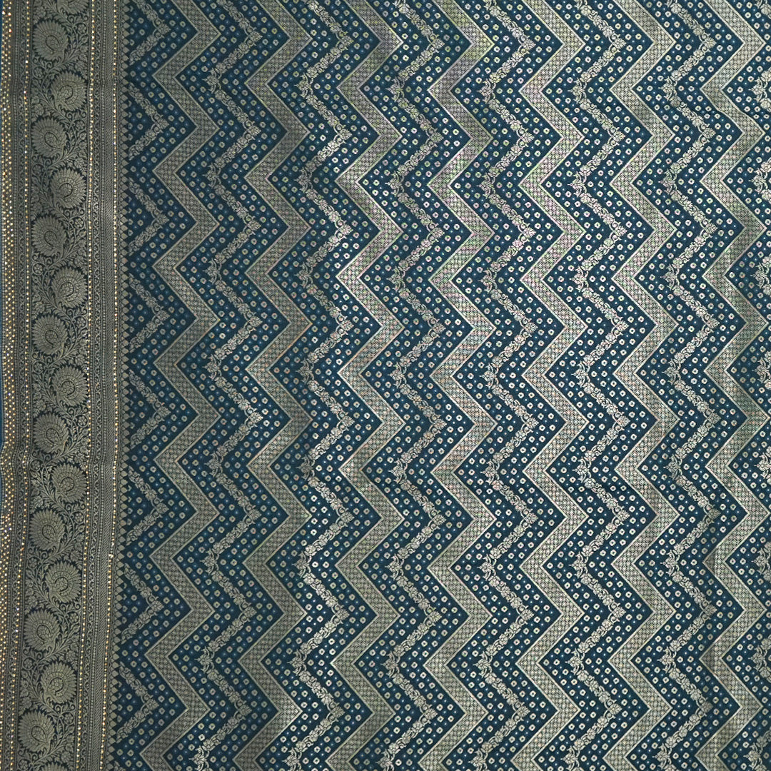 Tarani Silk saree in deep navy blue shade with a rich golden zari weave.