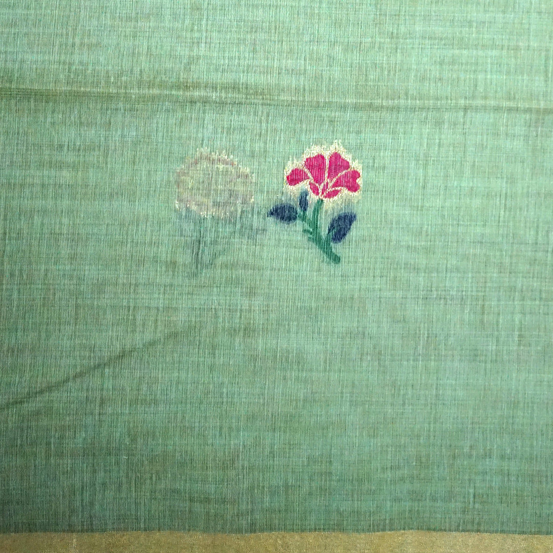 Varnica Tussar Soft pastel green shade with a subtle golden shimmer