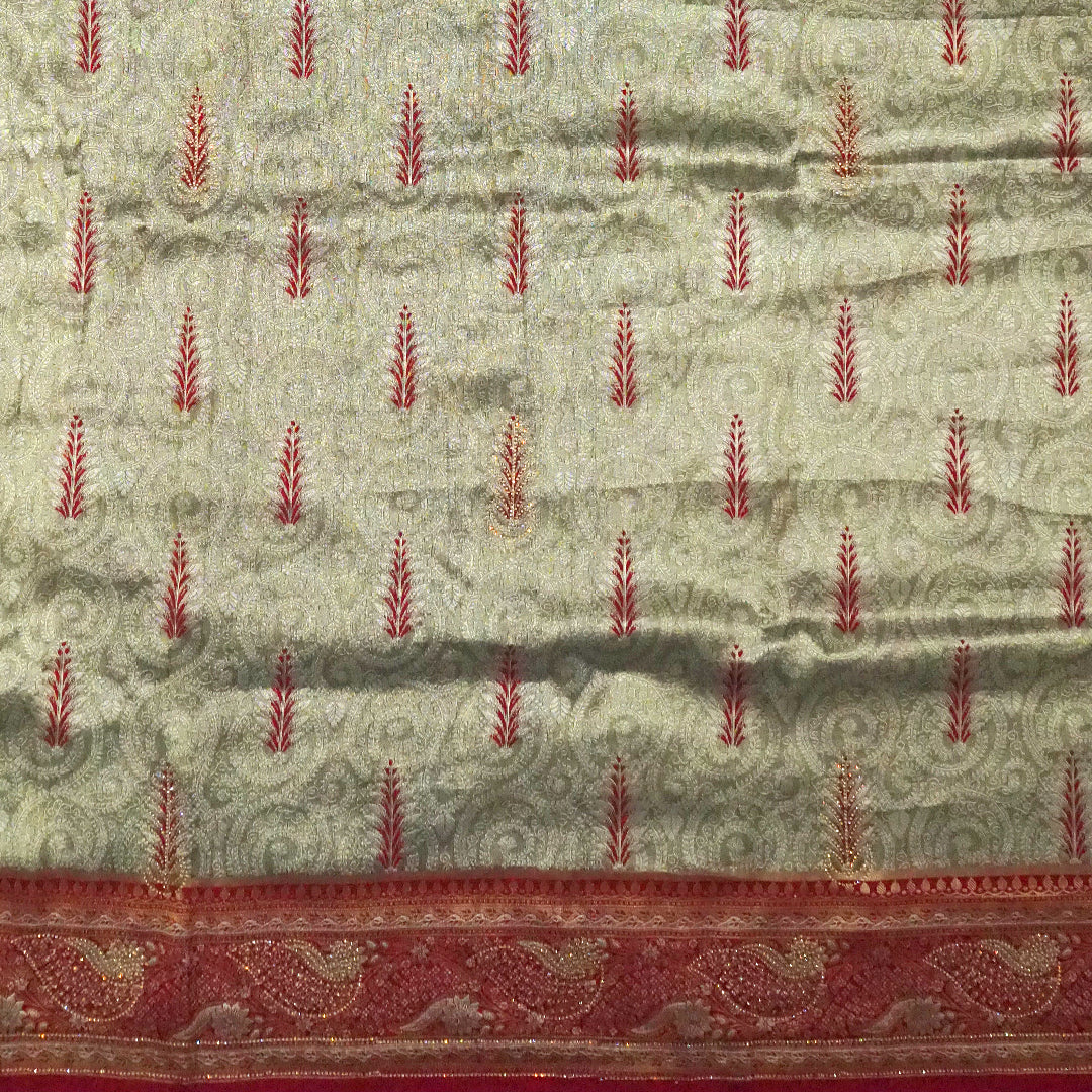 Madhur Bela Muted olive green shade with an elegant golden sheen