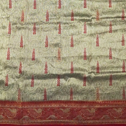 Madhur Bela Muted olive green shade with an elegant golden sheen