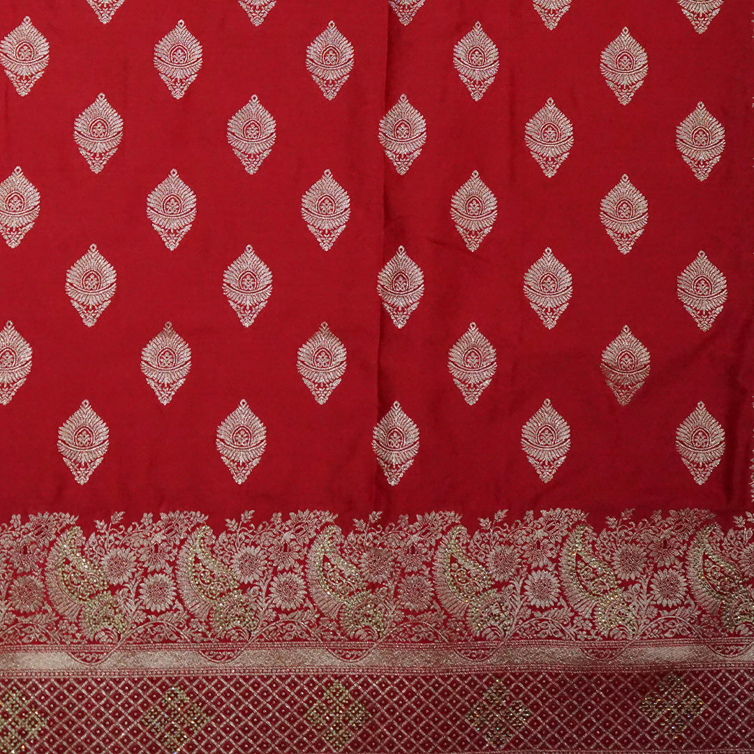 Rithvi Satin Deep red color adorned with intricate golden zari embroidery