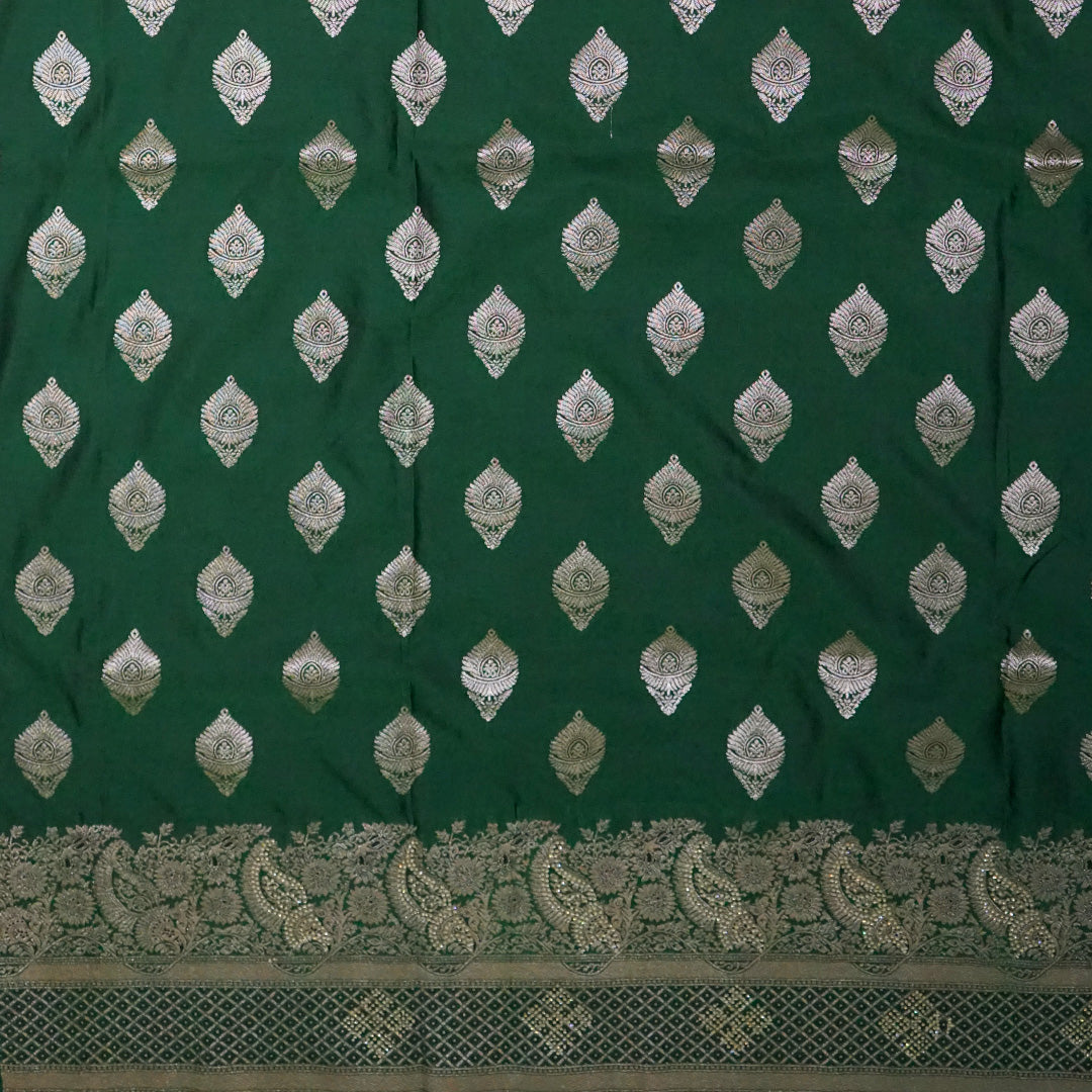 Rithvi Satin Emerald-green shade color adorned with intricate golden zari embroidery
