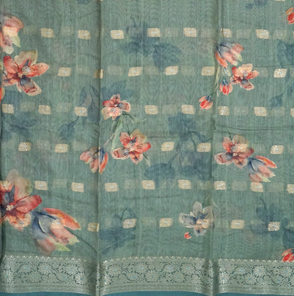 Hirakshi Silk in Teal Blue base with floral prints