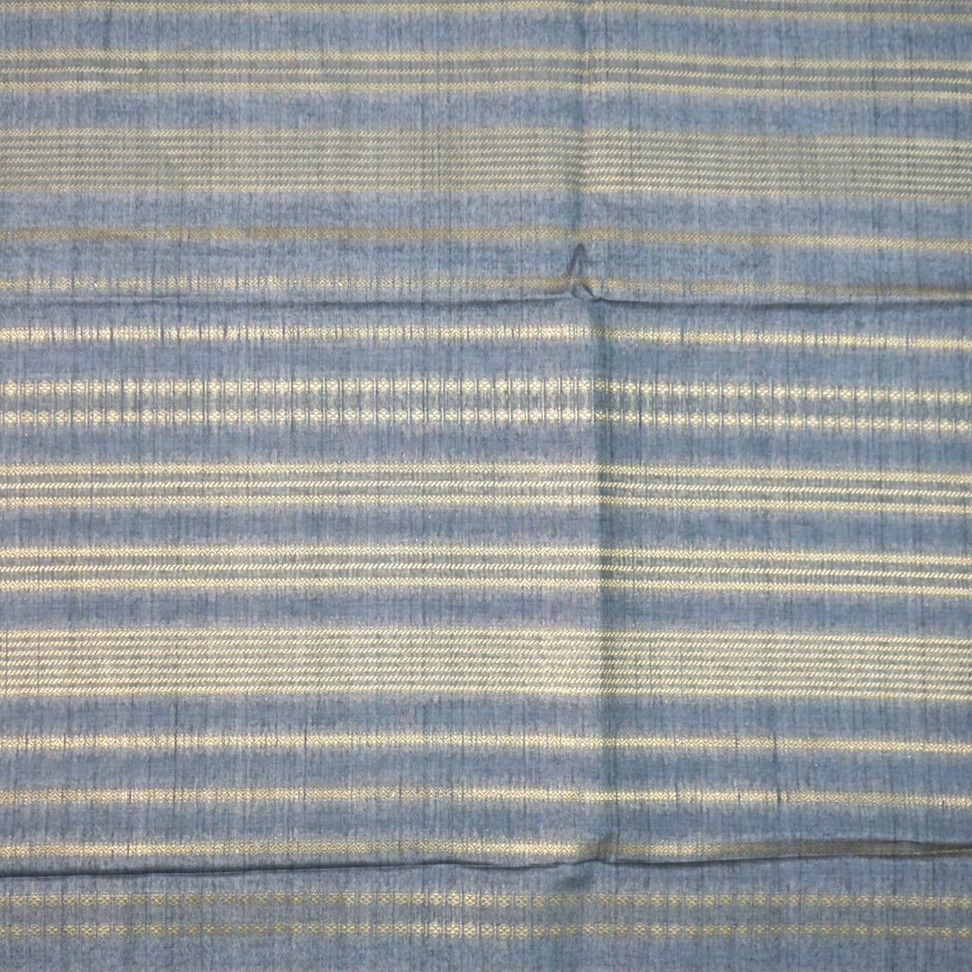 Subtle Grey Gokul Tussar with Red and Orange border.