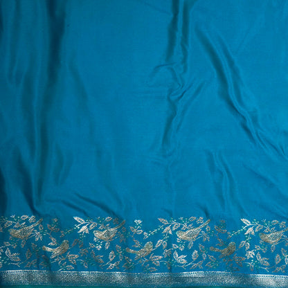Hamsini Silk saree in Vibrant teal blue shade with a lustrous silk texture.