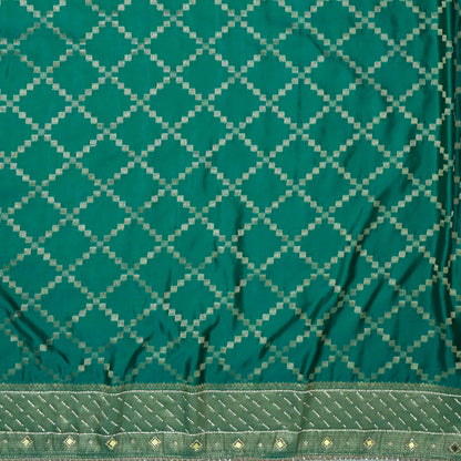 Samrudhi silk saree in vibrant combination of emerald green and lime green with a lustrous Banarasi silk finish.