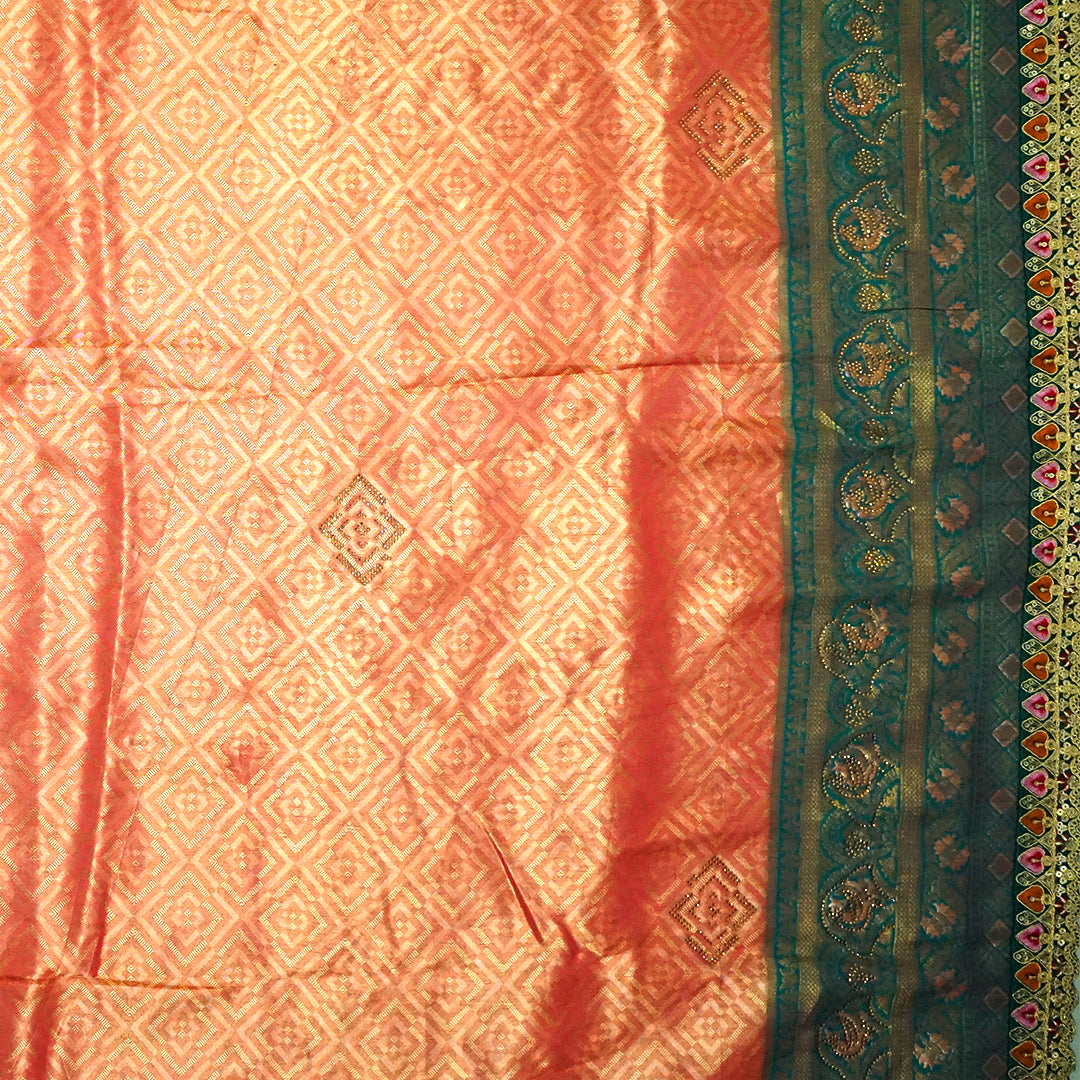 Peach-orange Raj Virasat Silk saree with Deep purple base and heavy embroidery.